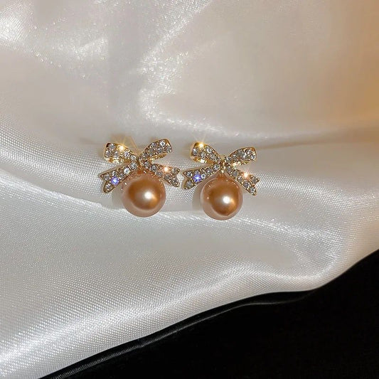 bow royal pearl earrings