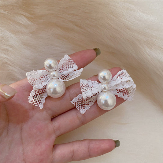 Pearly Trails Bow Earrings