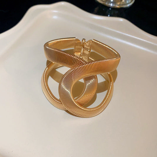 She’s curvy! Gold Handcuff