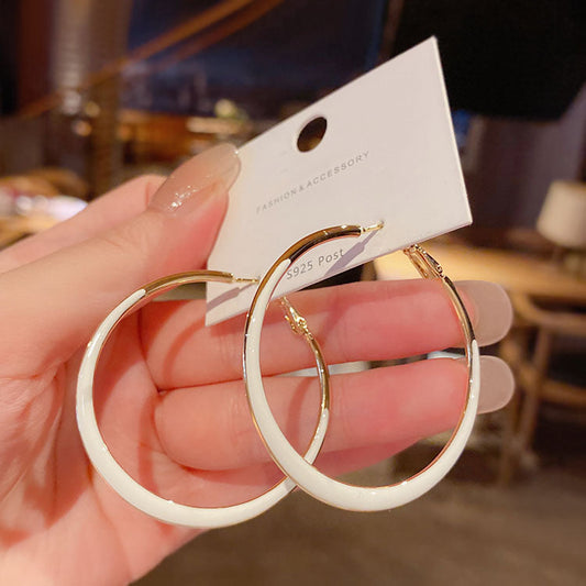 The Snow Swirl Hoop Earrings